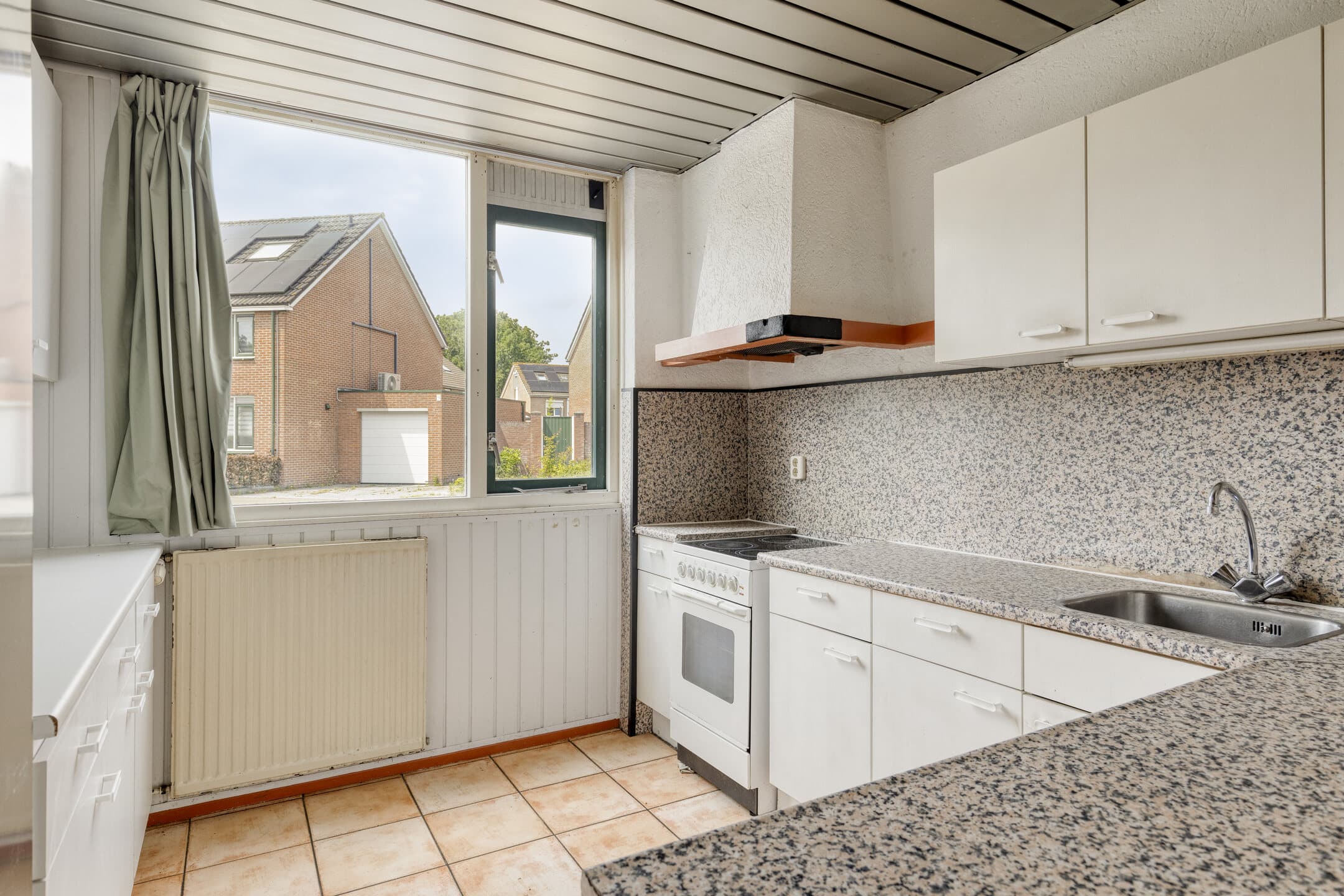Tussenwoning te koop: Heinoord 18, Breda