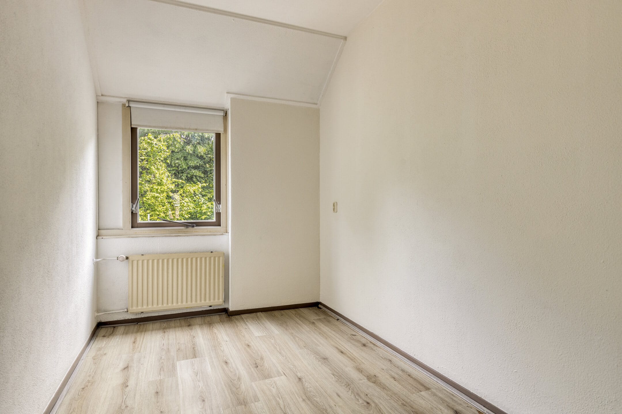 Tussenwoning te koop: Heinoord 18, Breda