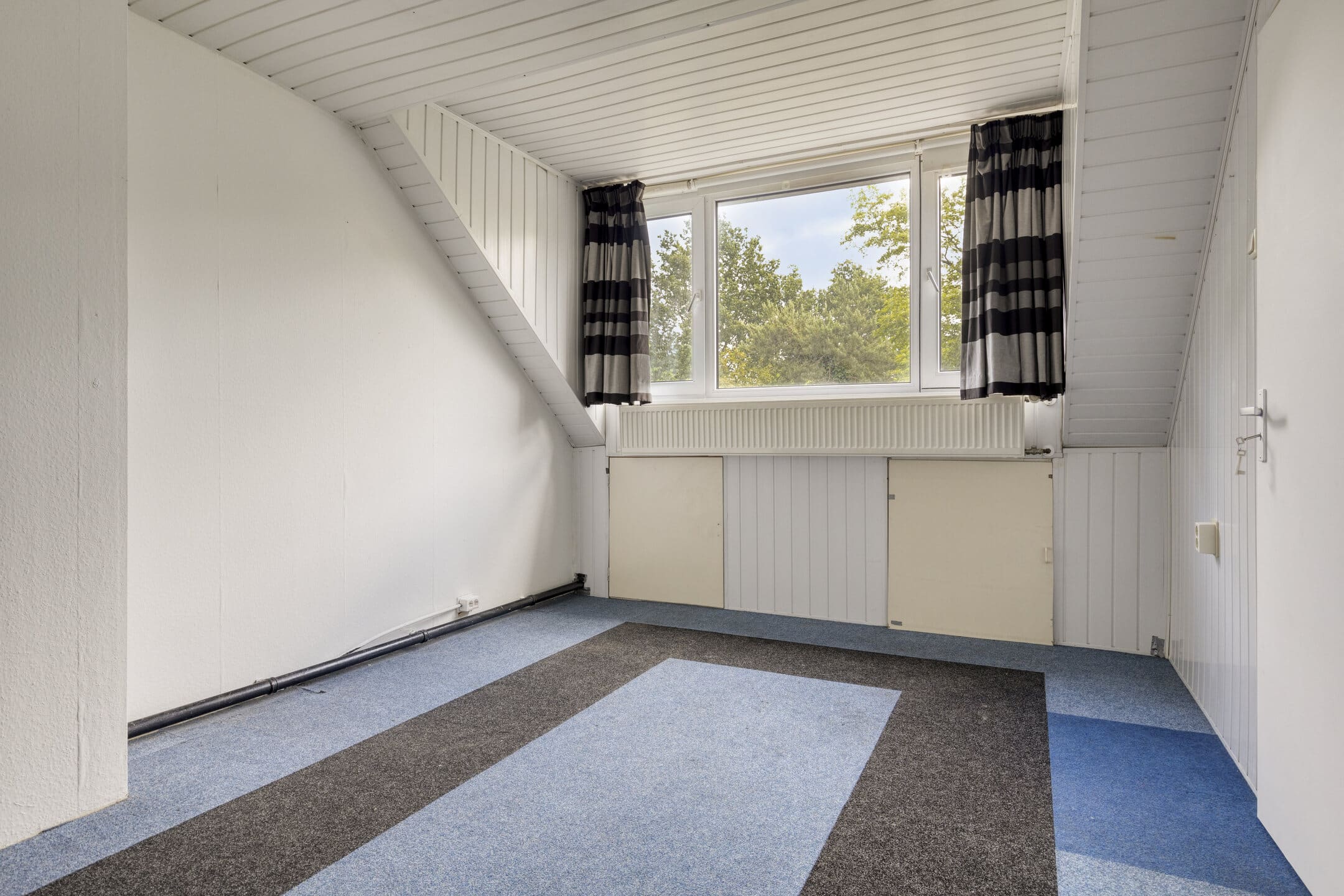 Tussenwoning te koop: Heinoord 18, Breda